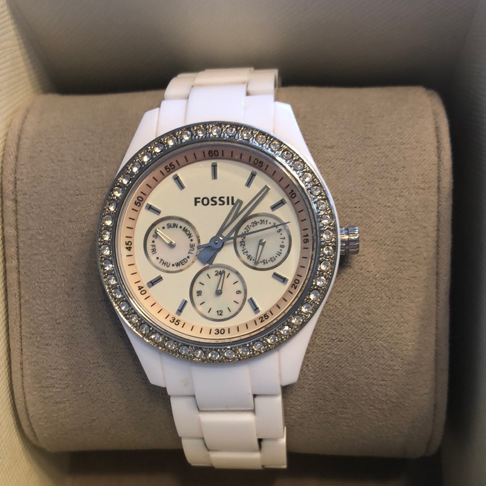 Womens Fossil watch with white band and bling.
